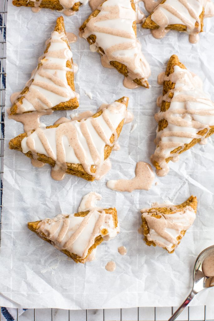Quick and easy Starbucks inspired mini glazed pumpkin scones are the perfect little fall treat packed with pumpkin flavour and topped with two sweet glazes. | aheadofthyme.com