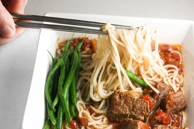 It's soup and slow cooker season! Add some noodles to your beef stew and transform it into the most amazing, flavourful slow cooker beef stew ramen. | aheadofthyme.com