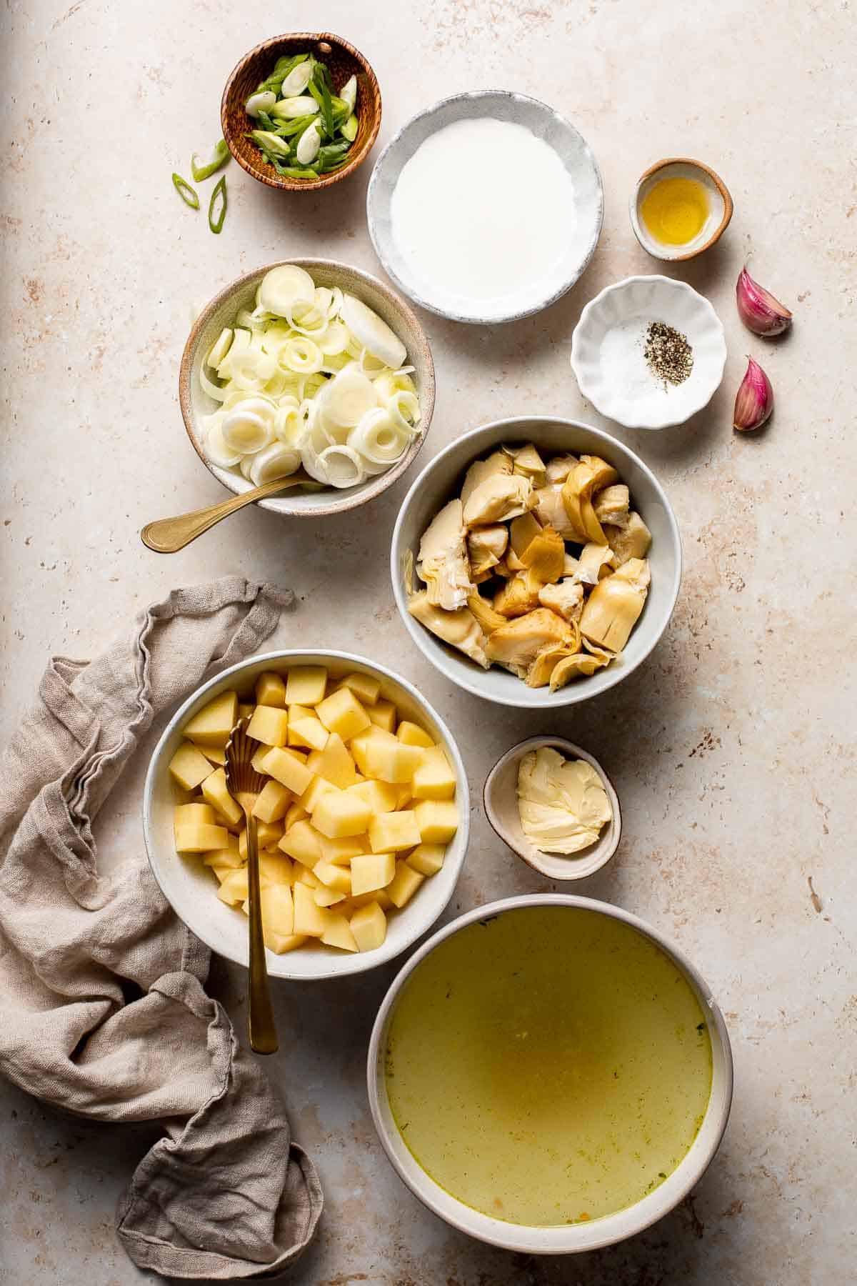 Creamy artichoke soup is rich, healthy, delicious, easy to make, and freezer-friendly. This vegetarian soup is loaded with artichokes, leeks, and potatoes. | aheadofthyme.com