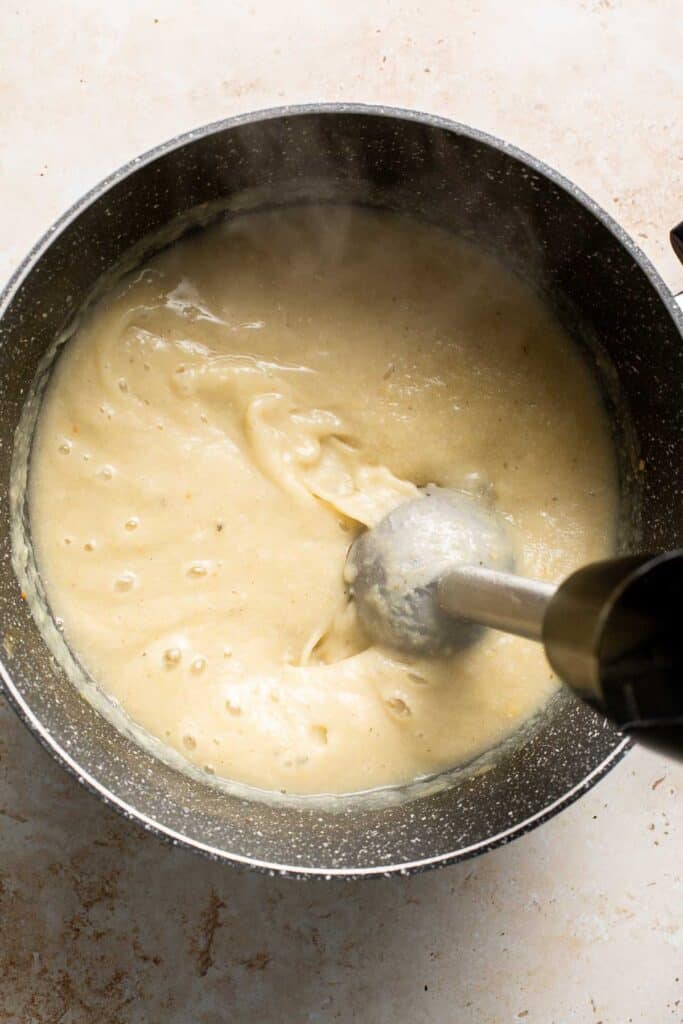 Creamy artichoke soup is rich, healthy, delicious, easy to make, and freezer-friendly. This vegetarian soup is loaded with artichokes, leeks, and potatoes. | aheadofthyme.com