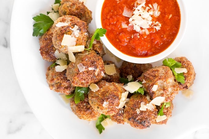 When it comes to weeknight menu planning, baked turkey meatballs reign supreme. Say hello to dinner ready in under 20 minutes from prep to table! | aheadofthyme.com