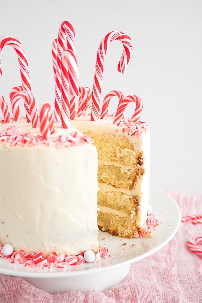 Looking for a showstopper at your next holiday party? Incorporate the minty taste of candy canes into this gorgeous, festive candy cane layered cake! | aheadofthyme.com