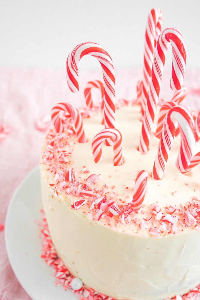 Looking for a showstopper at your next holiday party? Incorporate the minty taste of candy canes into this gorgeous, festive candy cane layered cake! | aheadofthyme.com