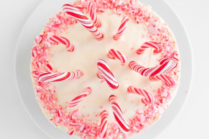 Looking for a showstopper at your next holiday party? Incorporate the minty taste of candy canes into this gorgeous, festive candy cane layered cake! | aheadofthyme.com