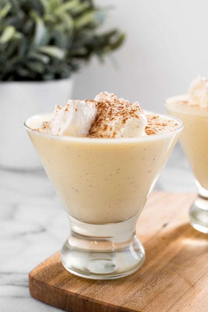 Non-alcoholic homemade eggnog is thick, sweet, creamy, and smooth. This family-friendly version of a classic holiday drink is way better than store-bought. | aheadofthyme.com