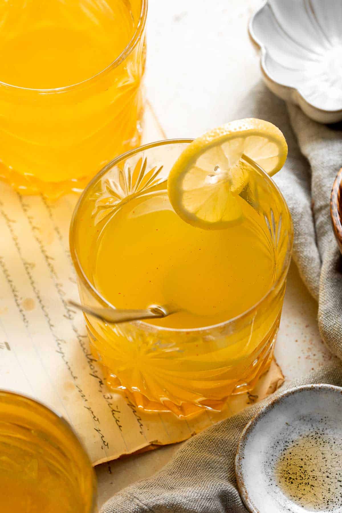 Apple Cider Vinegar Turmeric Detox Drink is a healthy way to start the day— clears toxins, aids in digestion and absorption of nutrients, and boosts energy. | aheadofthyme.com