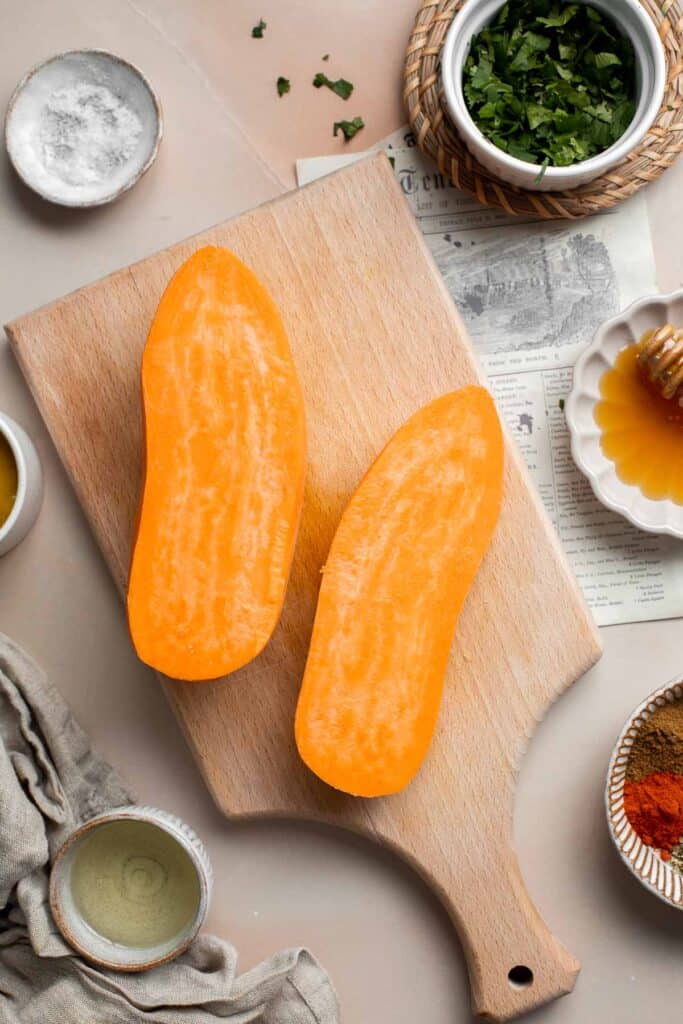 Baked Sweet Potato Wedges are crispy, delicious, flavorful. Serve as an appetizer or side dish. They are salty, savory, and sweet, with a hint of spice. | aheadofthyme.com