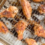 You will be amazed by how crispy these baked Asian chicken wings turn out! We add sriracha for heat, honey for sweetness, and ginger to balance the flavours. | aheadofthyme.com