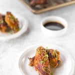 You will be amazed by how crispy these baked Asian chicken wings turn out! We add sriracha for heat, honey for sweetness, and ginger to balance the flavours. | aheadofthyme.com
