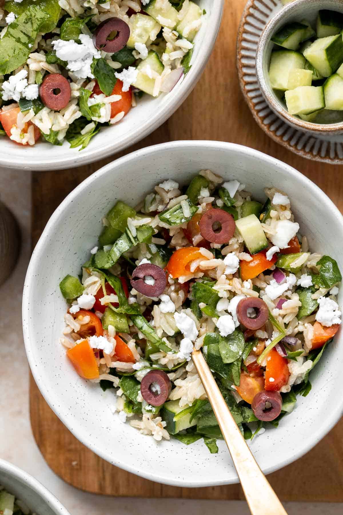 Mediterranean Brown Rice Salad loaded with veggies and tossed in a Greek dressing is filling, healthy, nutritious, gluten-free, and easy to make. | aheadofthyme.com