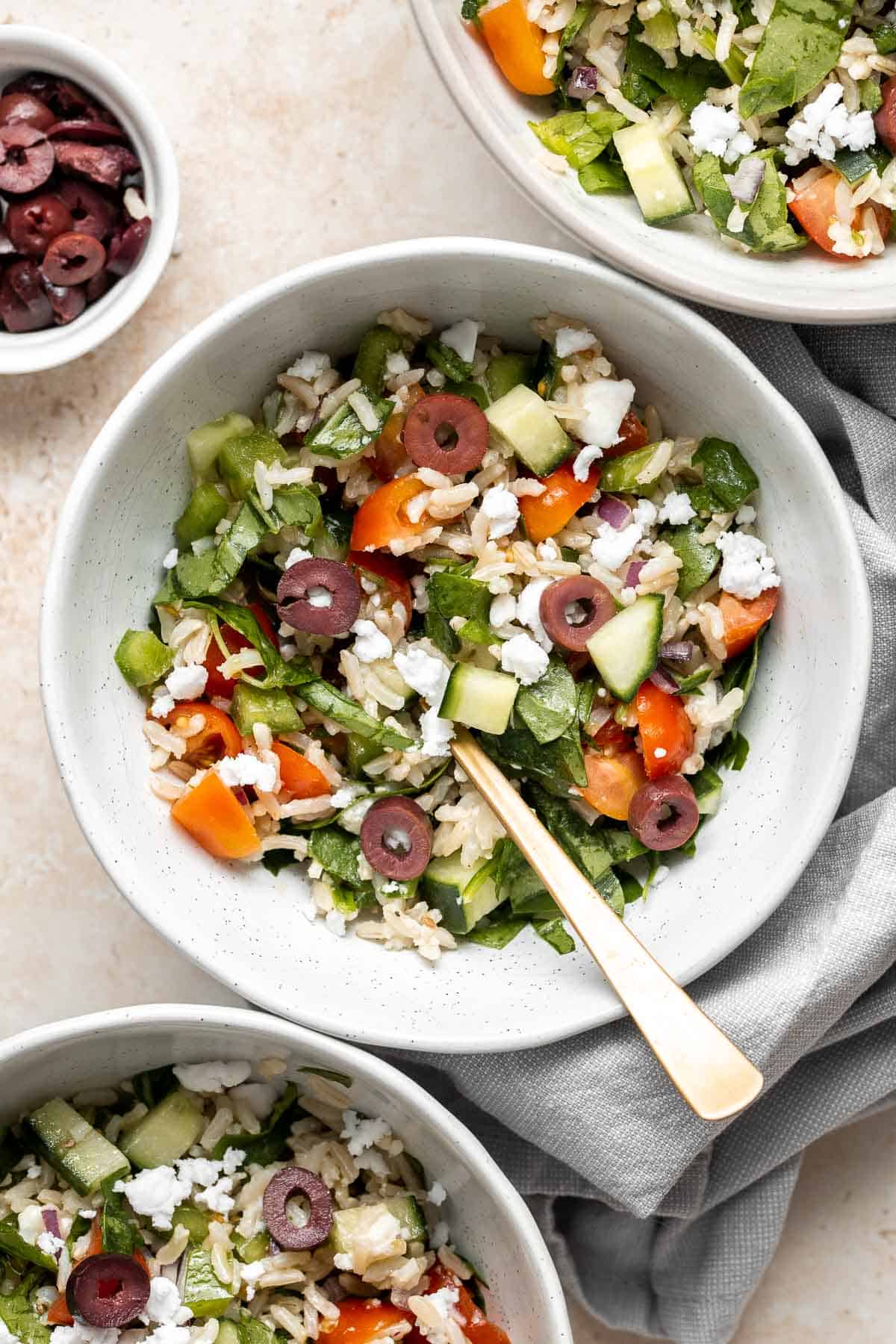 Mediterranean Brown Rice Salad loaded with veggies and tossed in a Greek dressing is filling, healthy, nutritious, gluten-free, and easy to make. | aheadofthyme.com