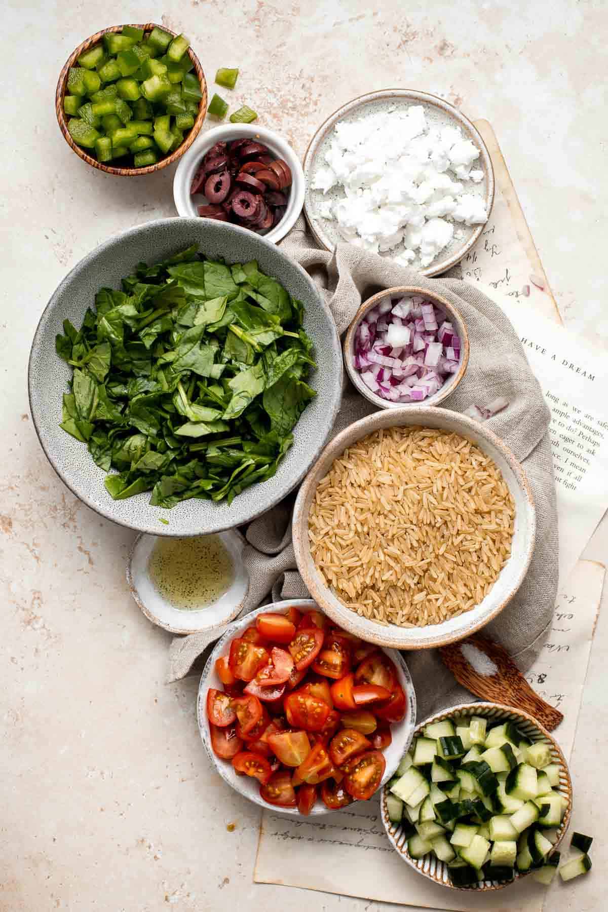 Mediterranean Brown Rice Salad loaded with veggies and tossed in a Greek dressing is filling, healthy, nutritious, gluten-free, and easy to make. | aheadofthyme.com