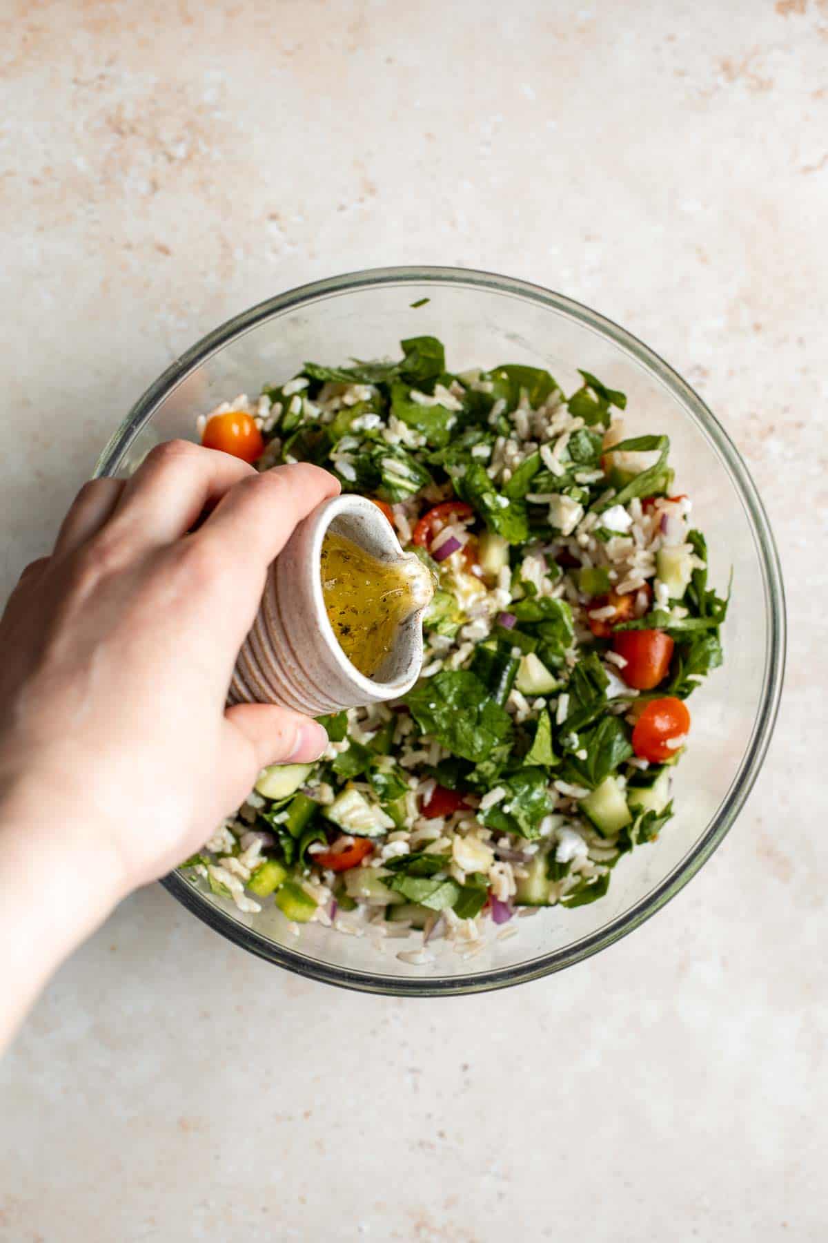 Mediterranean Brown Rice Salad loaded with veggies and tossed in a Greek dressing is filling, healthy, nutritious, gluten-free, and easy to make. | aheadofthyme.com