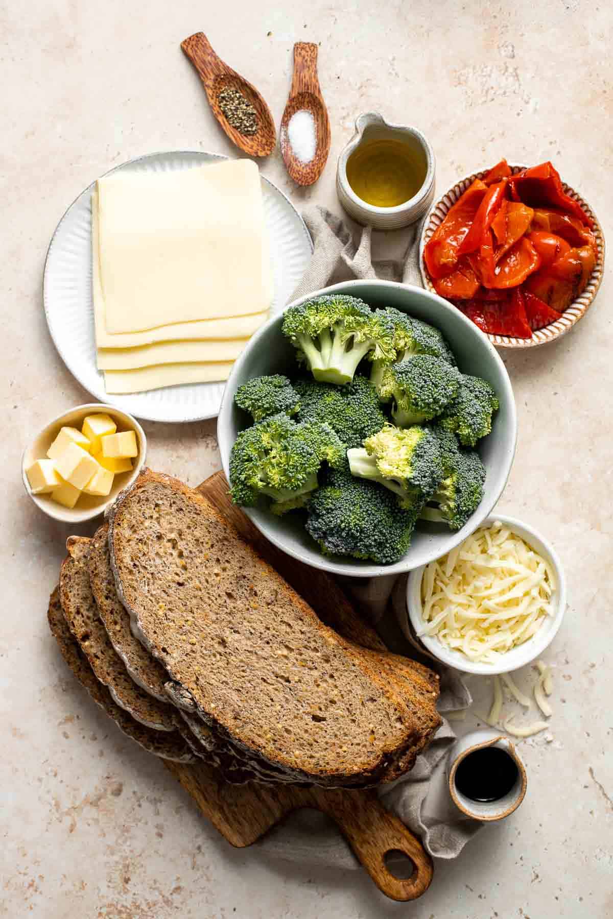 Take your grilled cheese game to the next level with Roasted Broccoli Grilled Cheese Sandwich made with broccoli, red peppers, cheddar, and mozzarella. | aheadofthyme.com