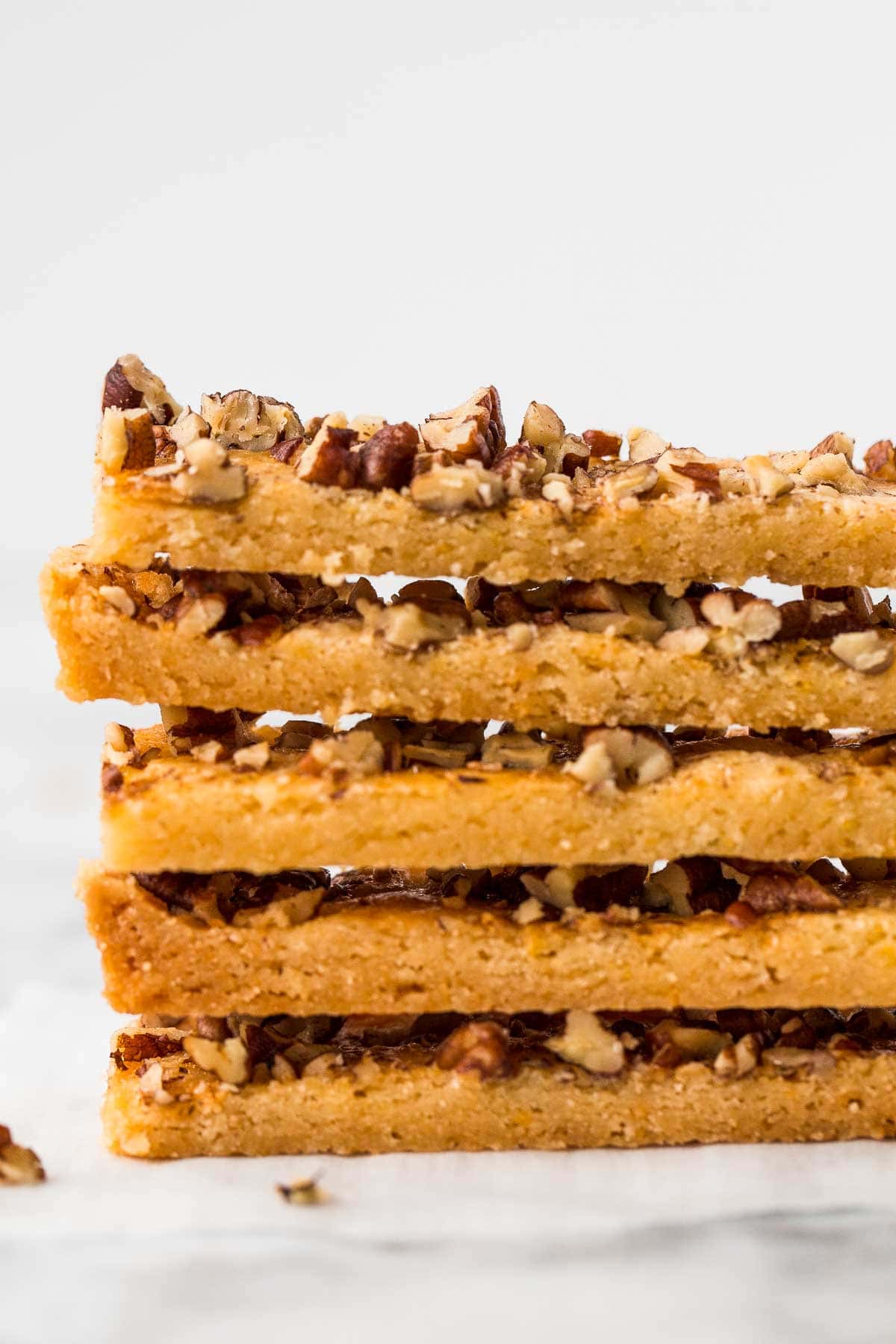 Pecan Shortbread Bars are delicious strips of buttery shortbread topped with crunchy nuts. Prepped in under 10 minutes with only 6 simple ingredients. | aheadofthyme.com