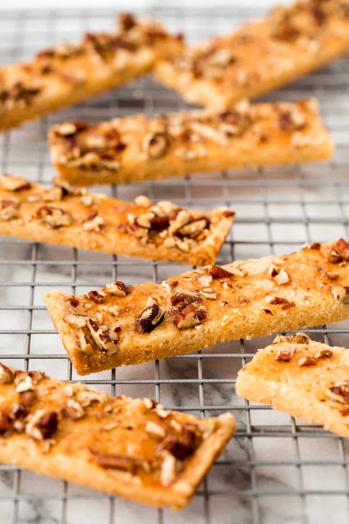 Pecan Shortbread Bars are delicious strips of buttery shortbread topped with crunchy nuts. Prepped in under 10 minutes with only 6 simple ingredients. | aheadofthyme.com