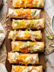 Baked mashed potato spring rolls combine creamy cheesy mashed potatoes with crispy golden wrappers for the ultimate JOEY copycat appetizer. | aheadofthyme.com