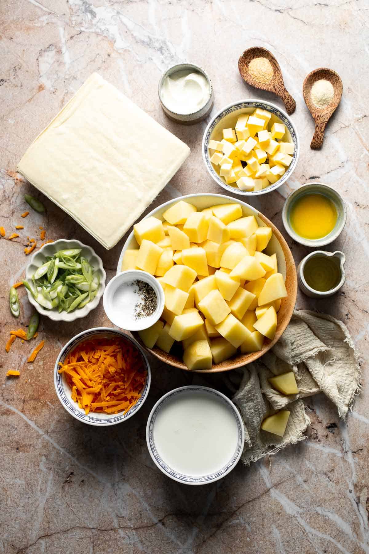 Baked mashed potato spring rolls combine creamy cheesy mashed potatoes with crispy golden wrappers for the ultimate JOEY copycat appetizer. | aheadofthyme.com