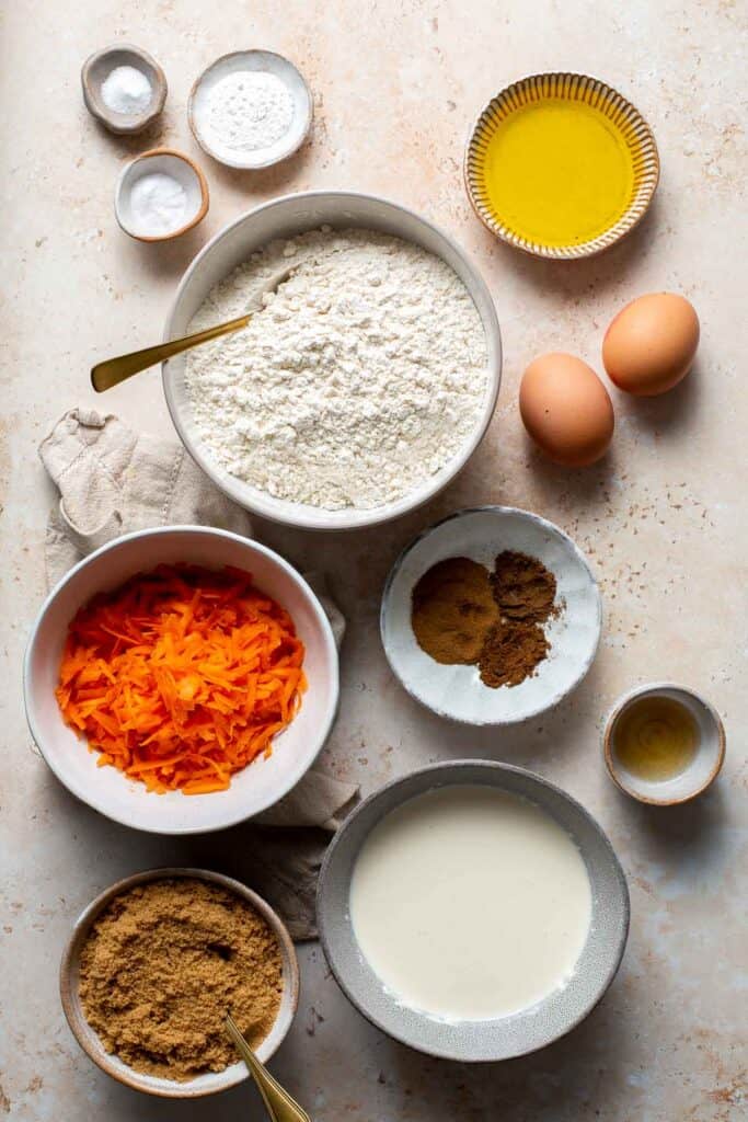 Carrot cake muffins are moist, light, chewy and full of carrots which means breakfast this week is healthy! Carrot muffins are great for meal prep too. | aheadofthyme.com