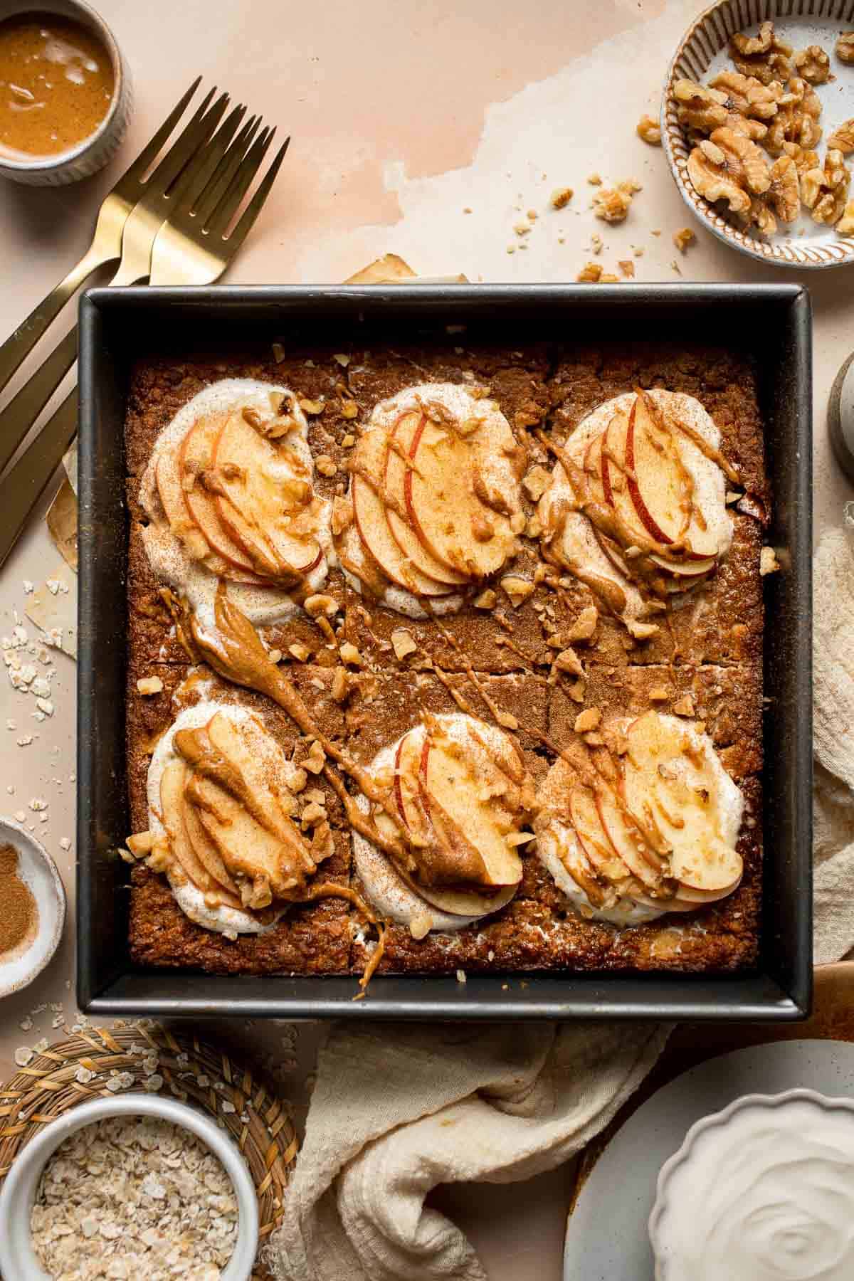 Cinnamon Apple Baked Oatmeal is a delicious, filling make-ahead breakfast for fall — loaded with chewy oats, tender apples, crunchy walnuts, and cinnamon. | aheadofthyme.com