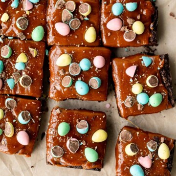 Rich, fudgy, and decadent, Easter egg caramel brownies are topped with an easy-to-make caramel sauce and topped with mini chocolate eggs. | aheadofthyme.com