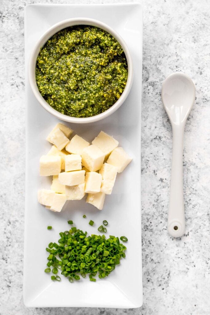 Spring pesto pasta with asparagus and chives is light and made with simple ingredients in under 20 minutes. Serve it hot for dinner or cold as pasta salad. | aheadofthyme.com