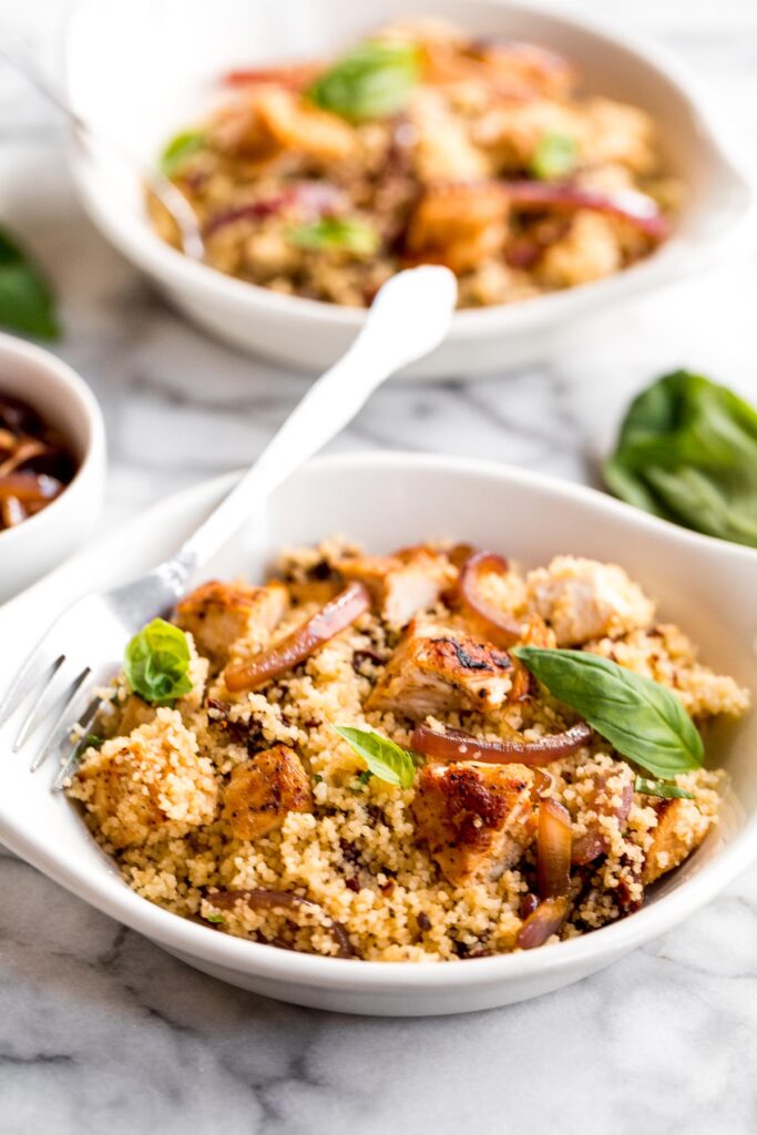 Simple, healthy and flavourful chicken and couscous with sun-dried tomatoes is ready in under 30 minutes. The easiest weeknight dinner to make tonight! | aheadofthyme.com