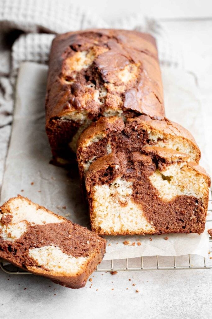 Chocolate and vanilla marble cake is delicious, moist, fluffy with the perfect golden brown crust. With two classic cake flavors, this loaf cake has it all. | aheadofthyme.com