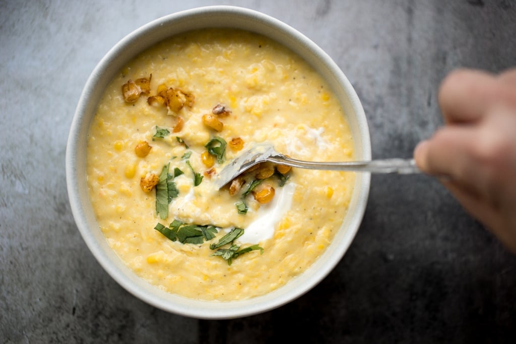 This vegetarian, hearty and filling, creamy Mexican corn soup is dense, bright, and full of flavour! It is the perfect Cinco de Mayo recipe. | aheadofthyme.com