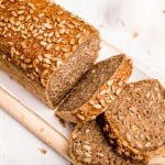 Learn how to make a delicious, golden brown loaf of homemade sunflower seed bread today! It is soft and fluffy on the inside, and crispy on the outside. | aheadofthyme.com
