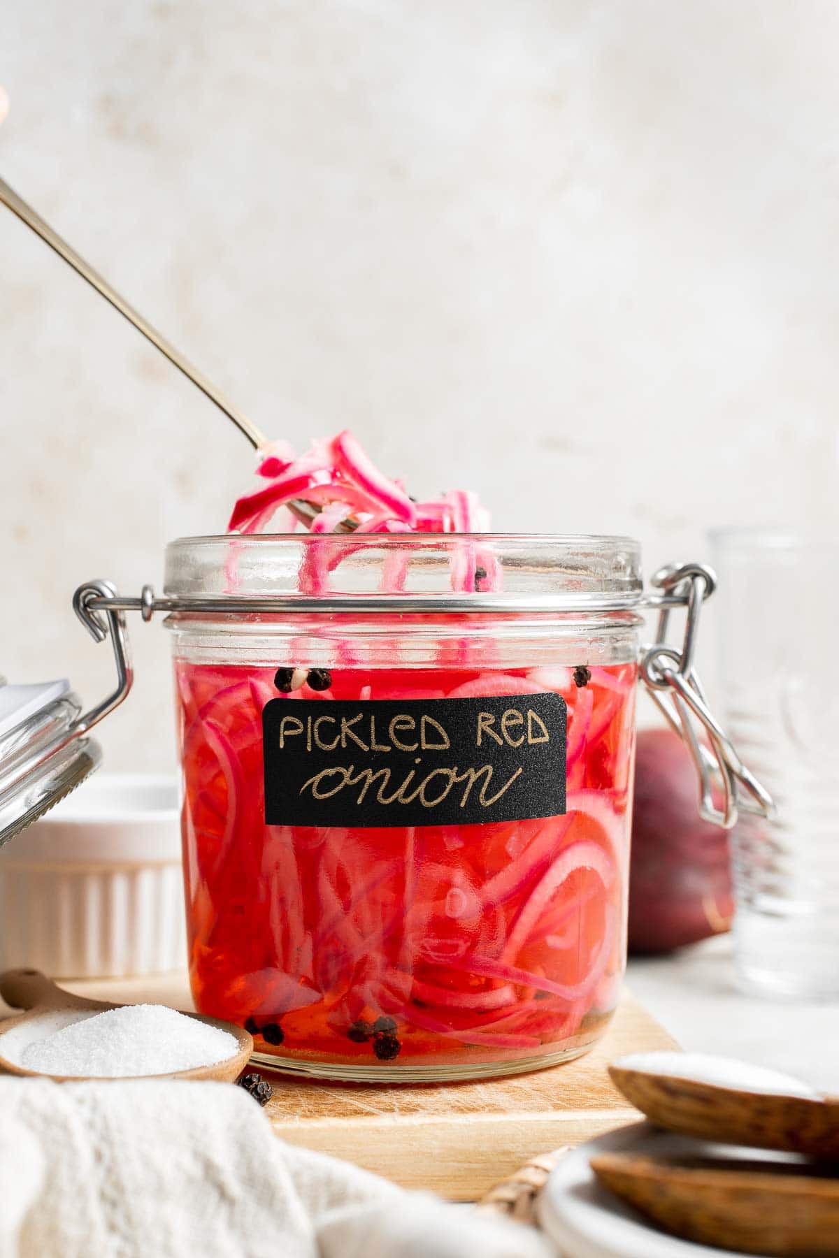 Looking to add some tangy flavor to your meals? Try this simple recipe for pickled red onions that can be made in just a few minutes and stored for weeks! | aheadofthyme.com