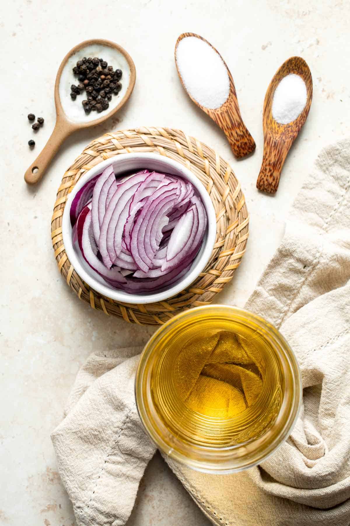Looking to add some tangy flavor to your meals? Try this simple recipe for pickled red onions that can be made in just a few minutes and stored for weeks! | aheadofthyme.com