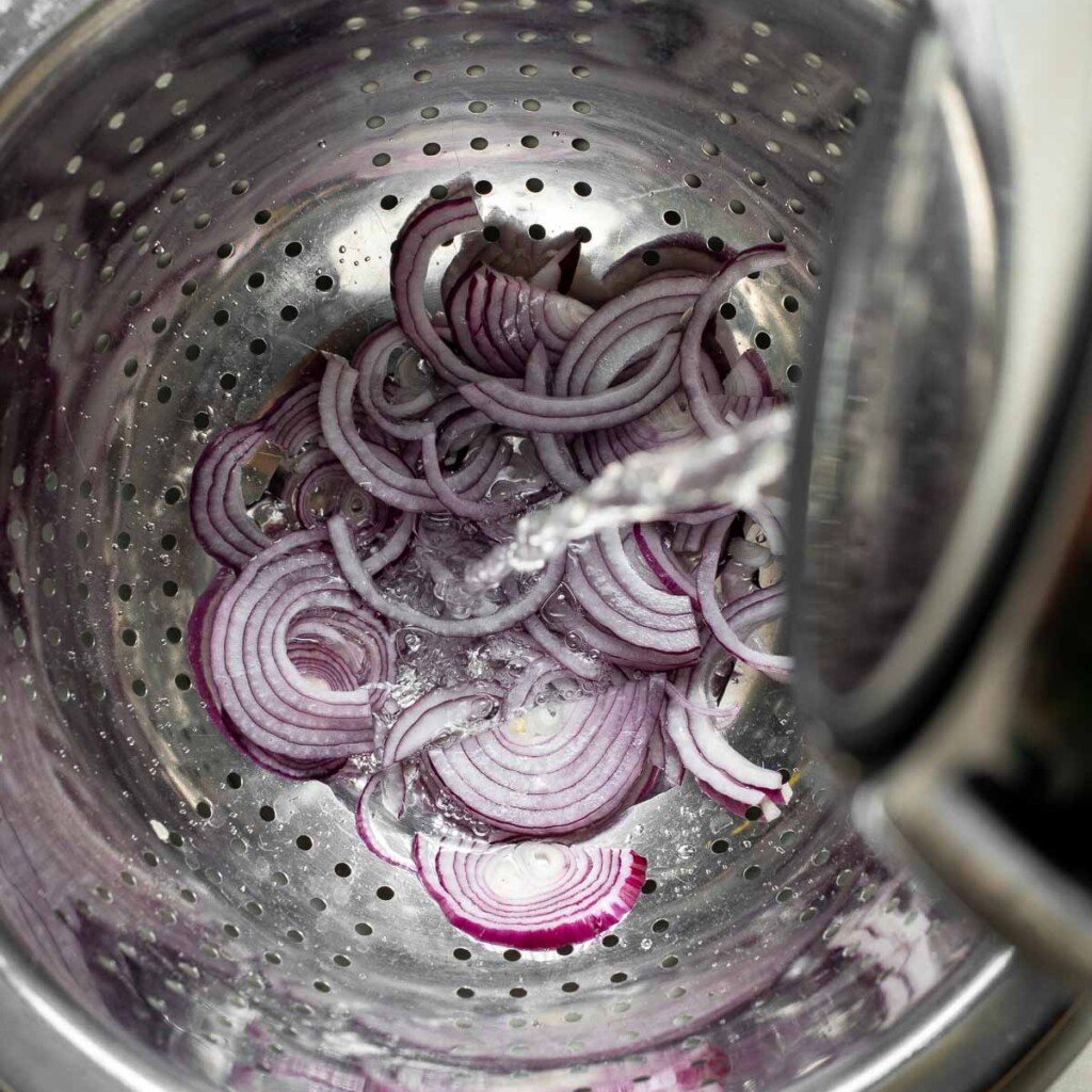 Looking to add some tangy flavor to your meals? Try this simple recipe for pickled red onions that can be made in just a few minutes and stored for weeks! | aheadofthyme.com
