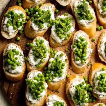 Ricotta Crostini with Peas and Mint is easily the most refreshing spring appetizer for any party. It's quick and easy to make and can be prepped ahead. | aheadofthyme.com