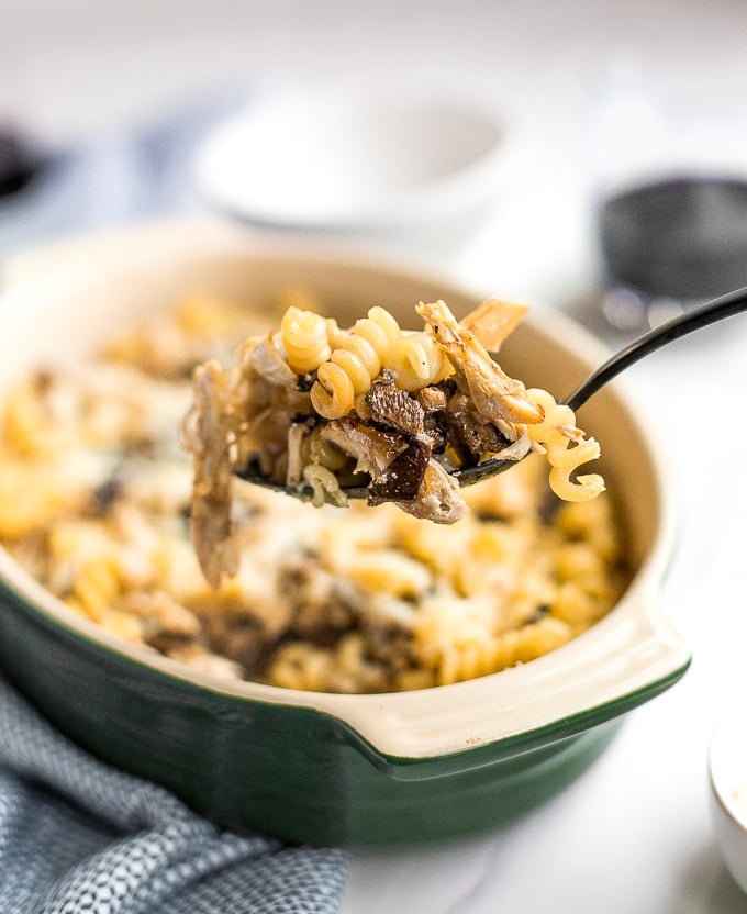 Need a pasta dish with layers of flavour in under 30 minutes? Look no further! Baked pasta with rotisserie chicken, earthy and warm shiitake mushrooms, and nutty asiago cheese is the perfect weeknight (or fancy dinner party) meal! | aheadofthyme.com