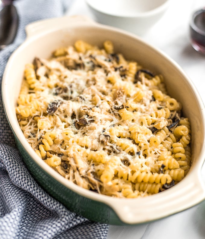 Need a pasta dish with layers of flavour in under 30 minutes? Look no further! Baked pasta with rotisserie chicken, earthy and warm shiitake mushrooms, and nutty asiago cheese is the perfect weeknight (or fancy dinner party) meal! | aheadofthyme.com