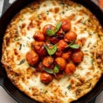 Caprese Frittata is light and fluffy, laced with fresh basil and topped with melted mozzarella cheese and blistered balsamic tomatoes. Ready in 10 minutes! | aheadofthyme.com