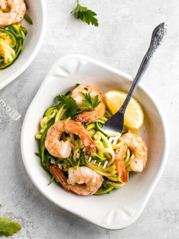 Shrimp scampi with zucchini noodles is a low-carb, keto, and gluten-free version of a classic pasta dish. It is healthy, garlicky, flavorful, and delicious. | aheadofthyme.com