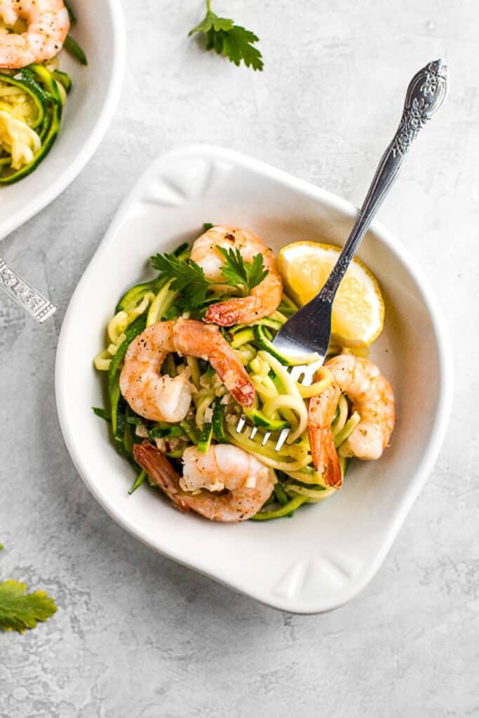 Shrimp scampi with zucchini noodles is a low-carb, keto, and gluten-free version of a classic pasta dish. It is healthy, garlicky, flavorful, and delicious. | aheadofthyme.com