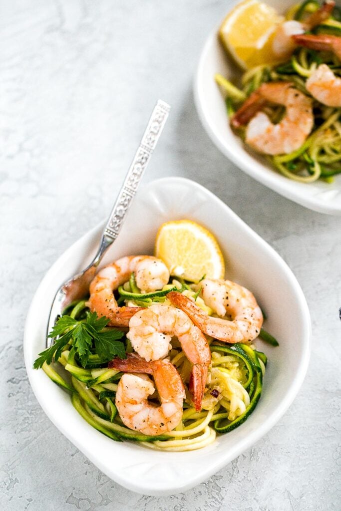 Shrimp scampi with zucchini noodles is a low-carb, keto, and gluten-free version of a classic pasta dish. It is healthy, garlicky, flavorful, and delicious. | aheadofthyme.com