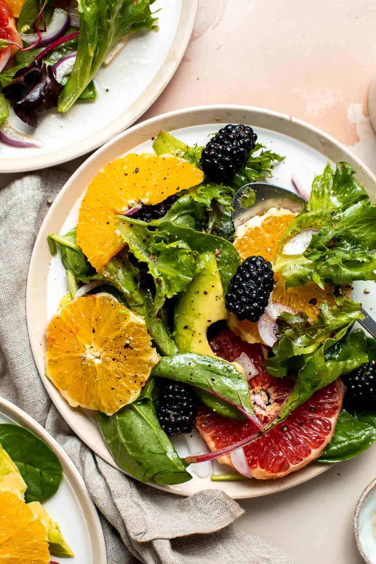 This Summer Citrus Salad is delicious, tangy, and colorful. It’s loaded with fresh fruit including oranges and grapefruit tossed in a citrus dressing. | aheadofthyme.com