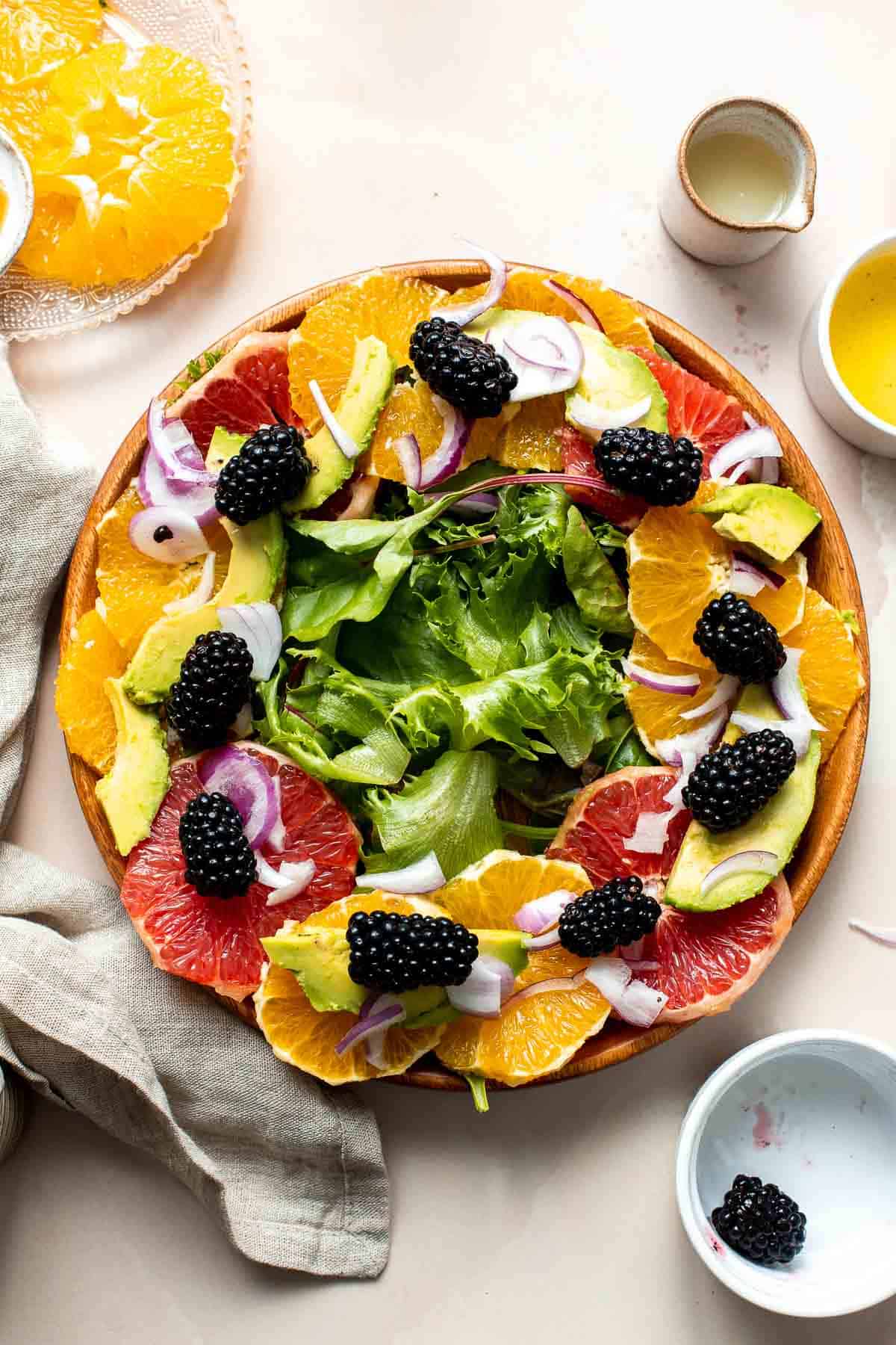 This Summer Citrus Salad is delicious, tangy, and colorful. It’s loaded with fresh fruit including oranges and grapefruit tossed in a citrus dressing. | aheadofthyme.com