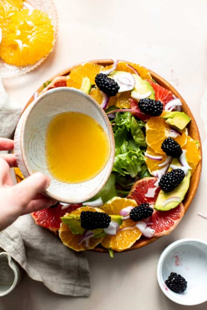 This Summer Citrus Salad is delicious, tangy, and colorful. It’s loaded with fresh fruit including oranges and grapefruit tossed in a citrus dressing. | aheadofthyme.com