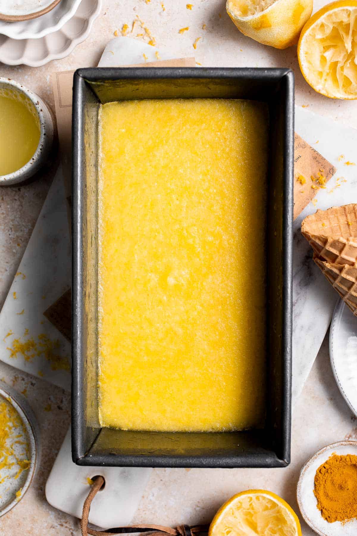 Looking for a refreshing summer treat? Try this easy, all-natural lemon sorbet, made with the added health benefits of turmeric for a bright yellow color. | aheadofthyme.com