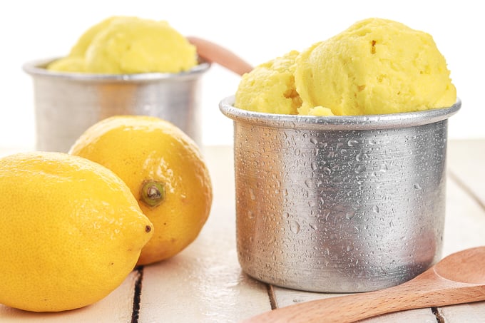 Grab a few easy ingredients, throw them in the blender and in a fews hours, a refreshing and unbelievably healthy lemon turmeric sorbet will be all set and ready for digging in!! | aheadofthyme.com