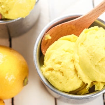 Grab a few easy ingredients, throw them in the blender and in a fews hours, a refreshing and unbelievably healthy lemon turmeric sorbet will be all set and ready for digging in!! | aheadofthyme.com