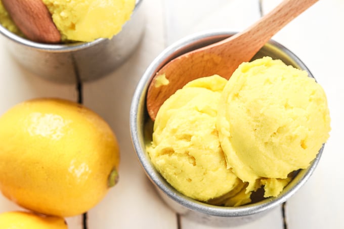 Grab a few easy ingredients, throw them in the blender and in a fews hours, a refreshing and unbelievably healthy lemon turmeric sorbet will be all set and ready for digging in!! | aheadofthyme.com