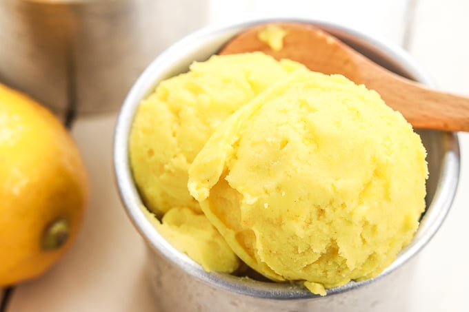 Grab a few easy ingredients, throw them in the blender and in a fews hours, a refreshing and unbelievably healthy lemon turmeric sorbet will be all set and ready for digging in!! | aheadofthyme.com