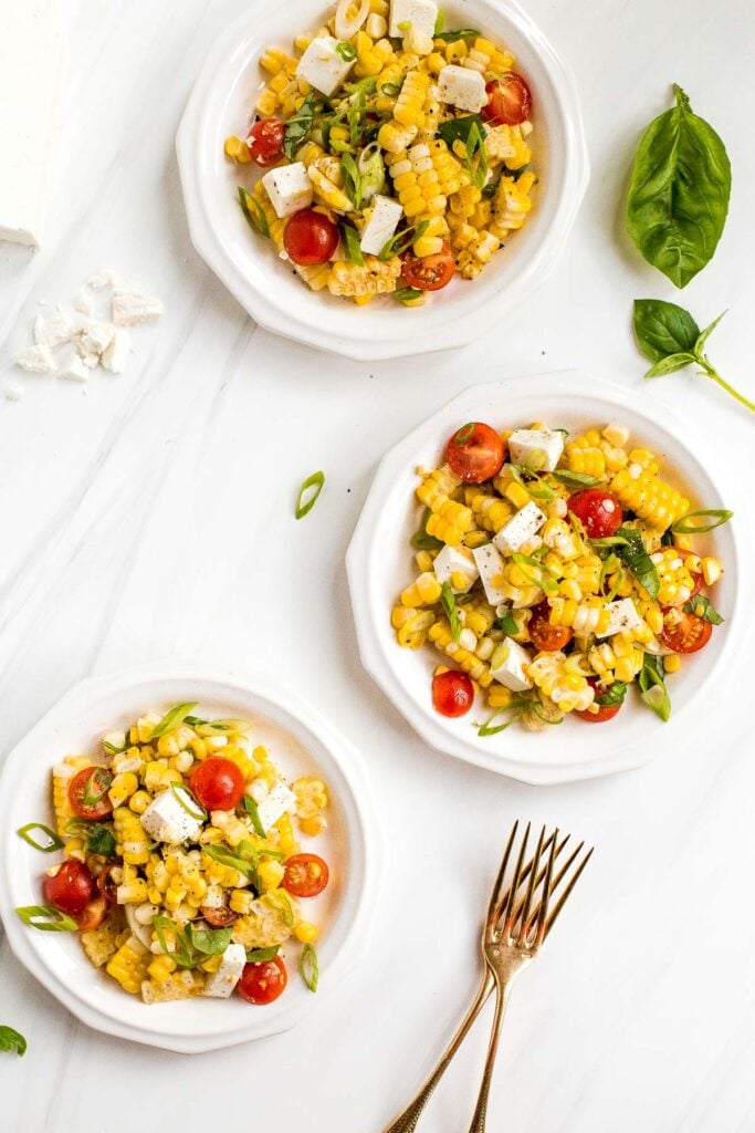 Summer corn salad is loaded to the brim with grilled corn, sweet cherry tomatoes, ricotta salata cheese, and fresh basil for that signature summer taste. | aheadofthyme.com