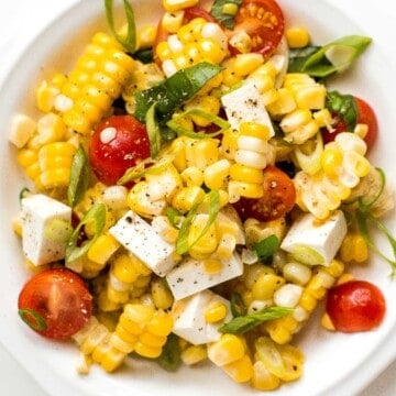 Summer corn salad is loaded to the brim with grilled corn, sweet cherry tomatoes, ricotta salata cheese, and fresh basil for that signature summer taste. | aheadofthyme.com